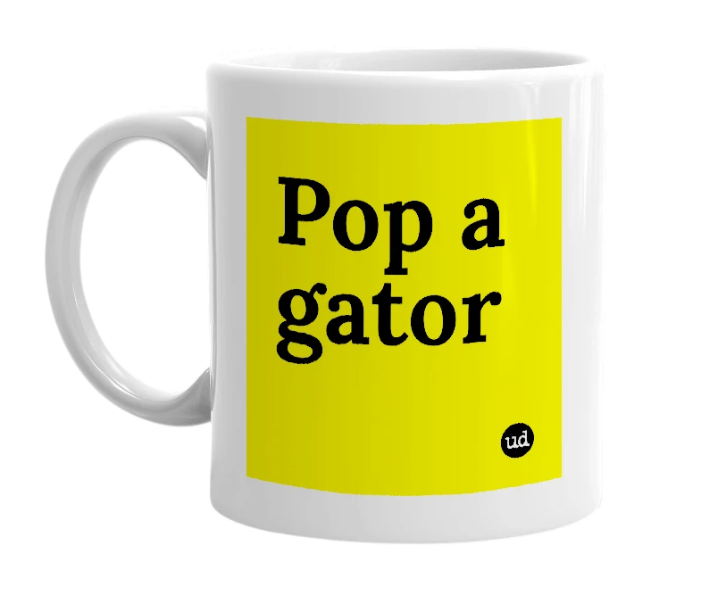 White mug with 'Pop a gator' in bold black letters