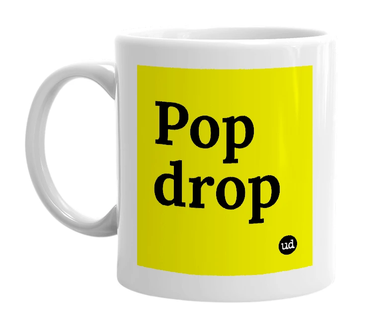 White mug with 'Pop drop' in bold black letters