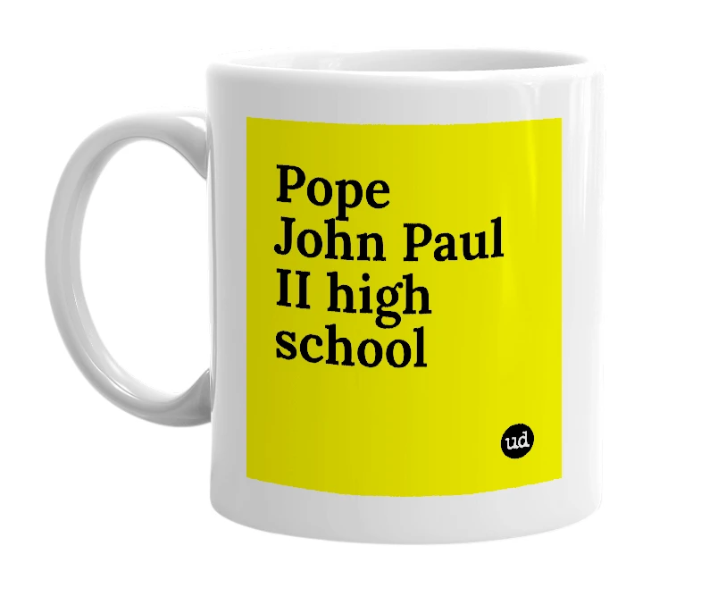 White mug with 'Pope John Paul II high school' in bold black letters