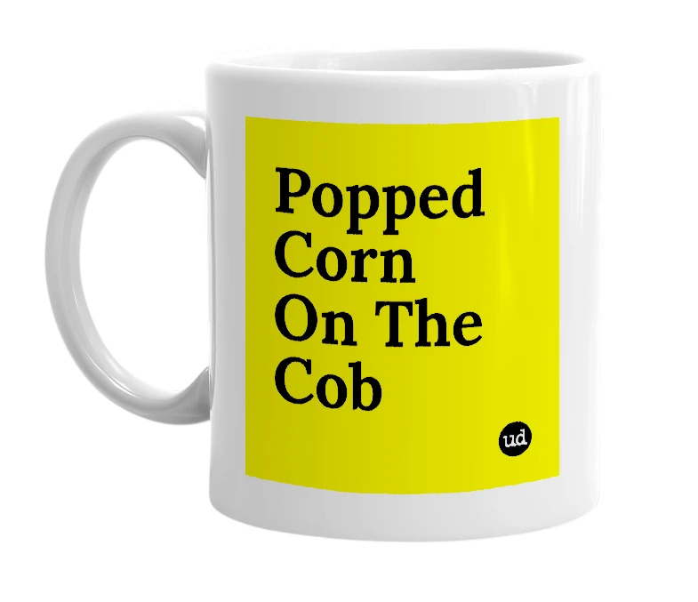White mug with 'Popped Corn On The Cob' in bold black letters