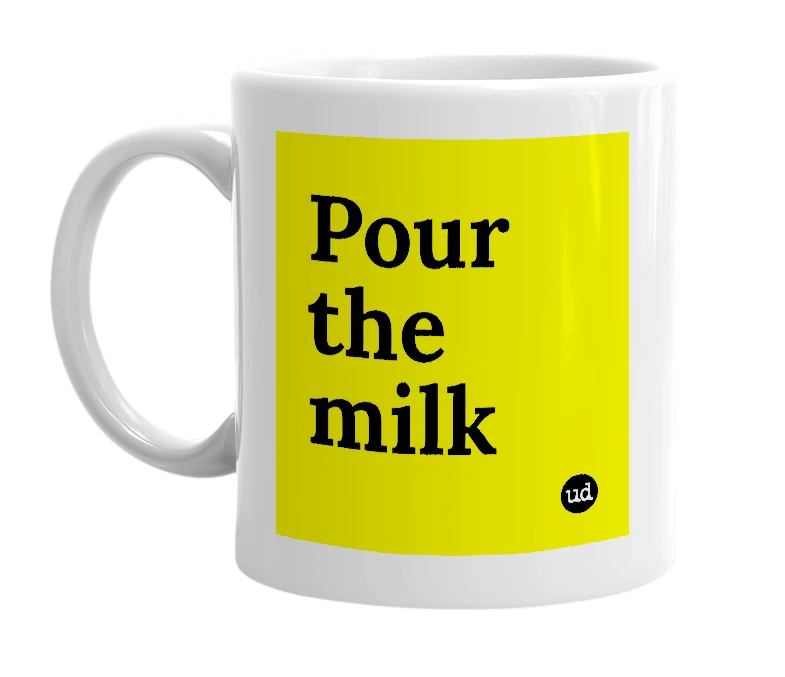 White mug with 'Pour the milk' in bold black letters