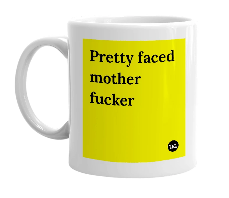 White mug with 'Pretty faced mother fucker' in bold black letters