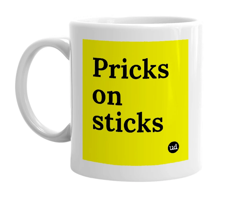 White mug with 'Pricks on sticks' in bold black letters
