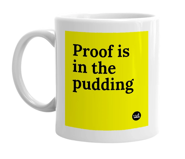 White mug with 'Proof is in the pudding' in bold black letters