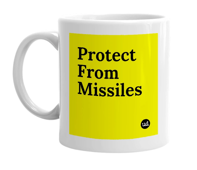 White mug with 'Protect From Missiles' in bold black letters