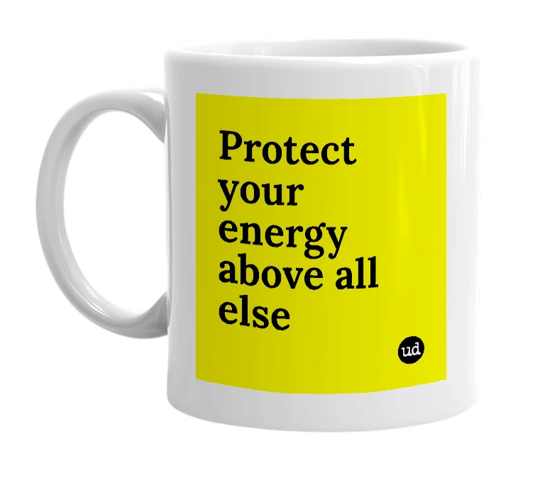White mug with 'Protect your energy above all else' in bold black letters