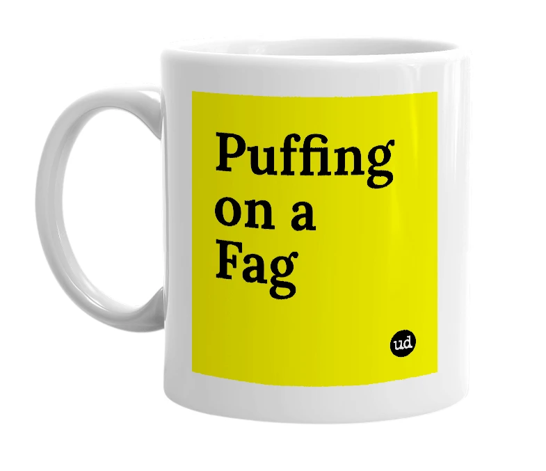 White mug with 'Puffing on a Fag' in bold black letters