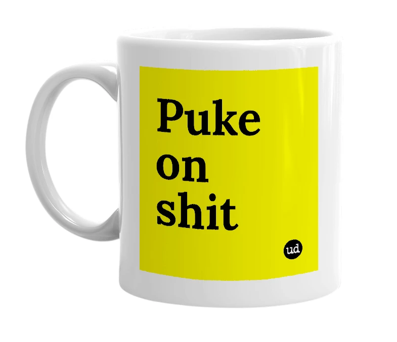 White mug with 'Puke on shit' in bold black letters