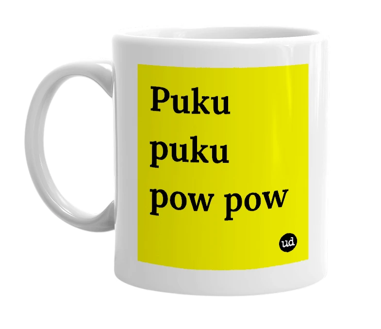 White mug with 'Puku puku pow pow' in bold black letters