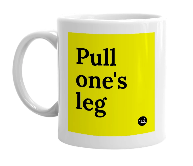 White mug with 'Pull one's leg' in bold black letters