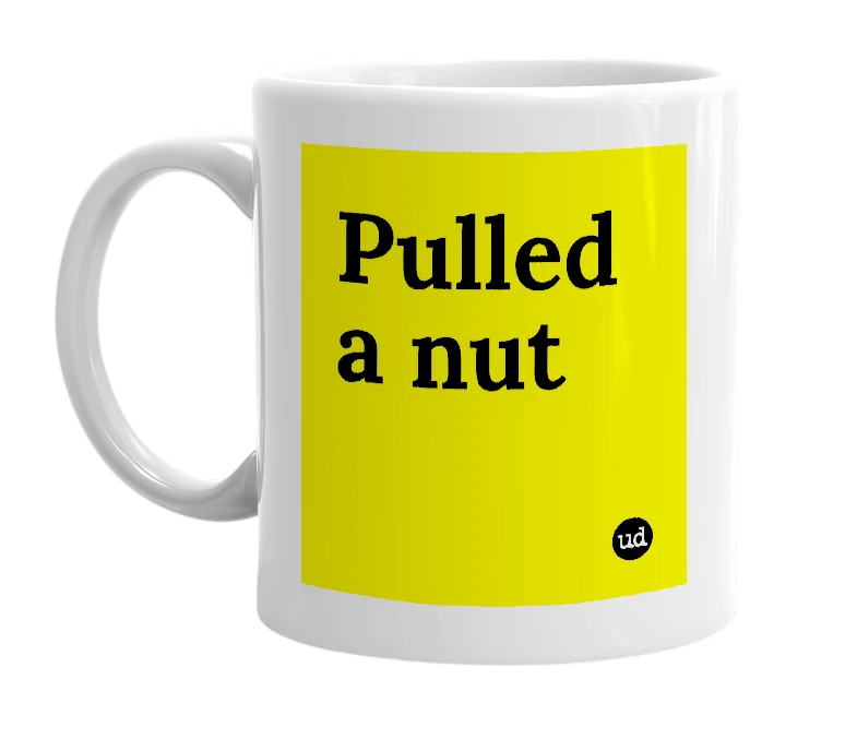 White mug with 'Pulled a nut' in bold black letters