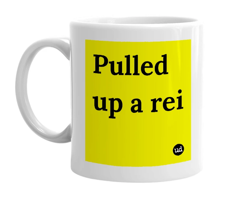 White mug with 'Pulled up a rei' in bold black letters