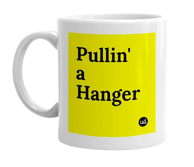 White mug with 'Pullin' a Hanger' in bold black letters