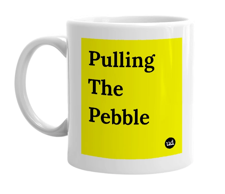 White mug with 'Pulling The Pebble' in bold black letters