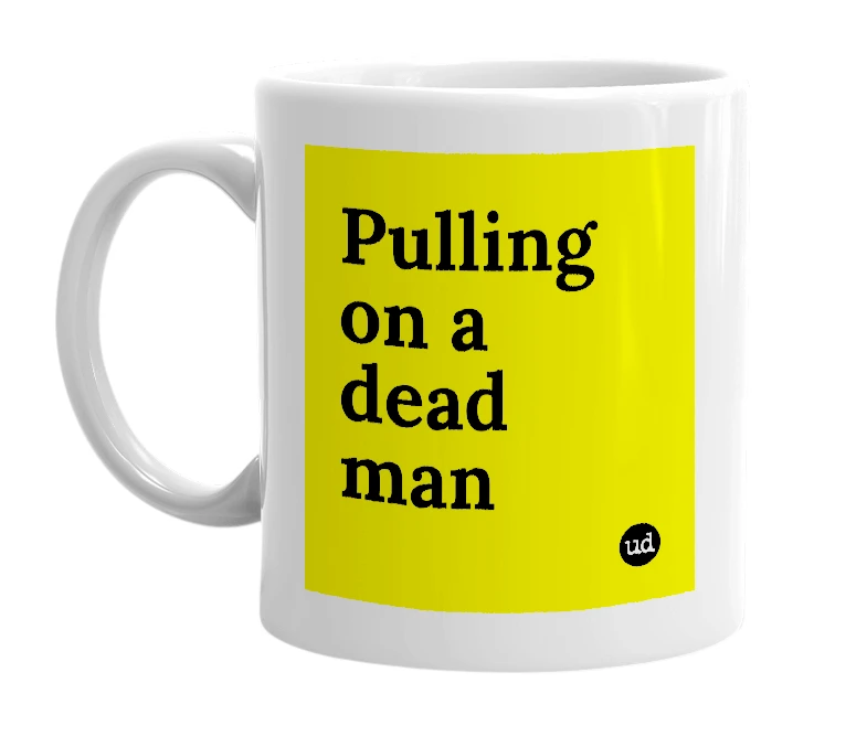 White mug with 'Pulling on a dead man' in bold black letters