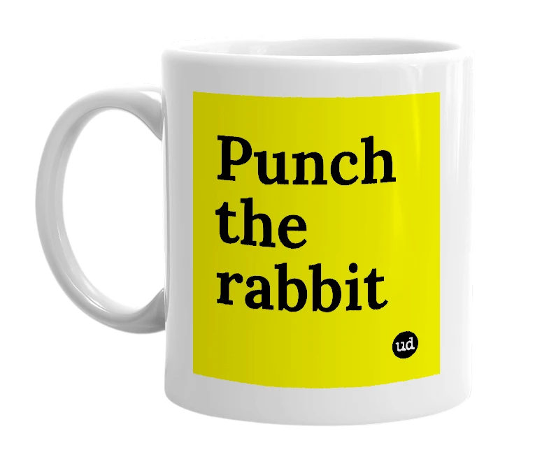 White mug with 'Punch the rabbit' in bold black letters