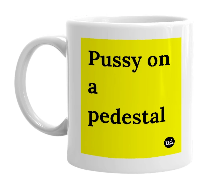 White mug with 'Pussy on a pedestal' in bold black letters