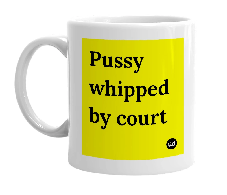 White mug with 'Pussy whipped by court' in bold black letters
