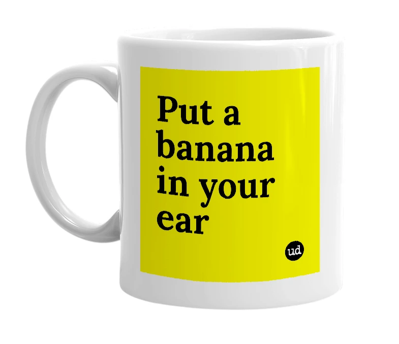 White mug with 'Put a banana in your ear' in bold black letters