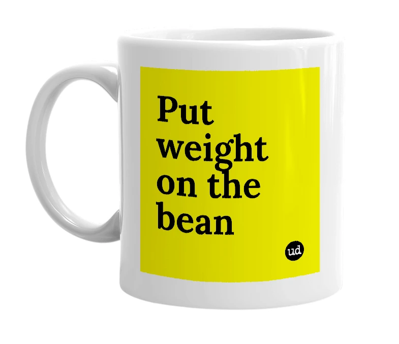 White mug with 'Put weight on the bean' in bold black letters
