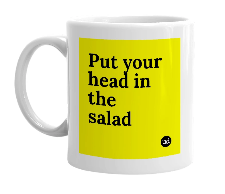 White mug with 'Put your head in the salad' in bold black letters