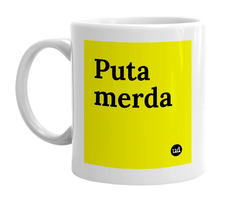 White mug with 'Puta merda' in bold black letters