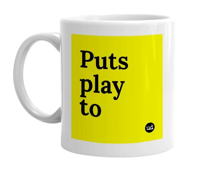 White mug with 'Puts play to' in bold black letters