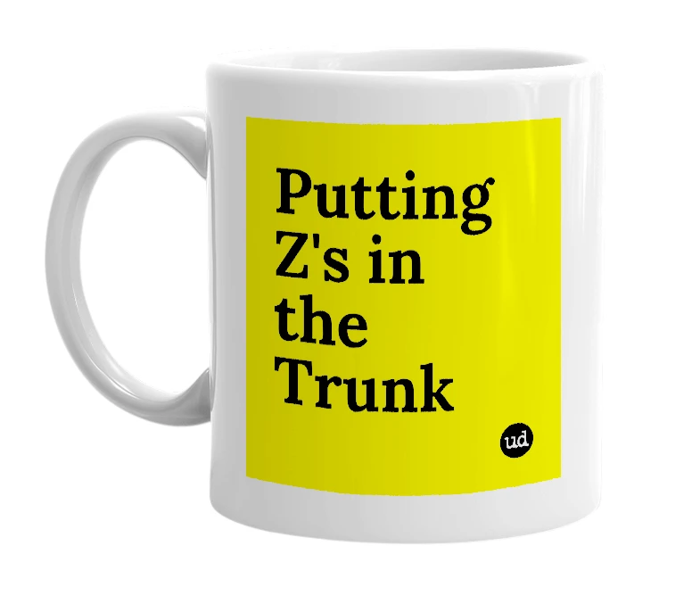 White mug with 'Putting Z's in the Trunk' in bold black letters