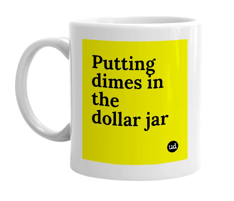 White mug with 'Putting dimes in the dollar jar' in bold black letters