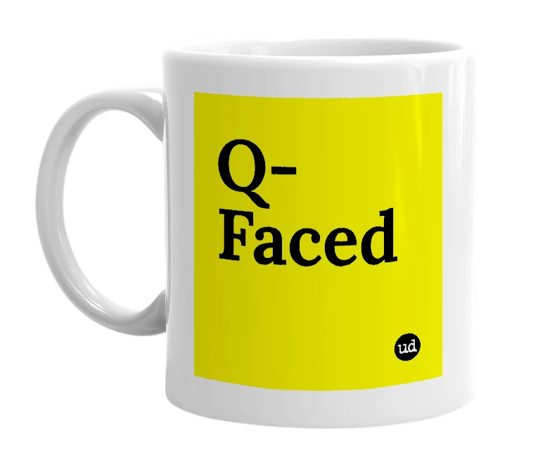 White mug with 'Q-Faced' in bold black letters