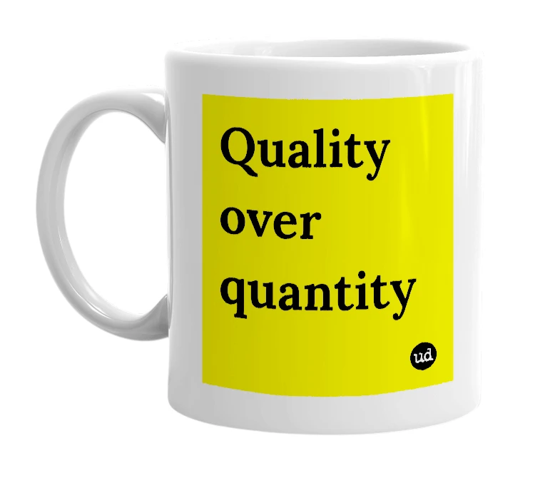 White mug with 'Quality over quantity' in bold black letters