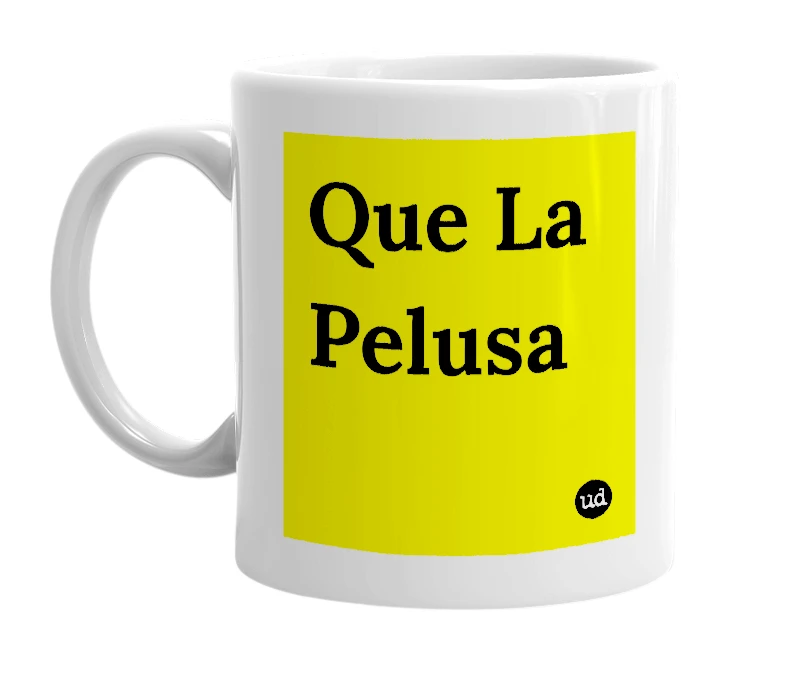 White mug with 'Que La Pelusa' in bold black letters