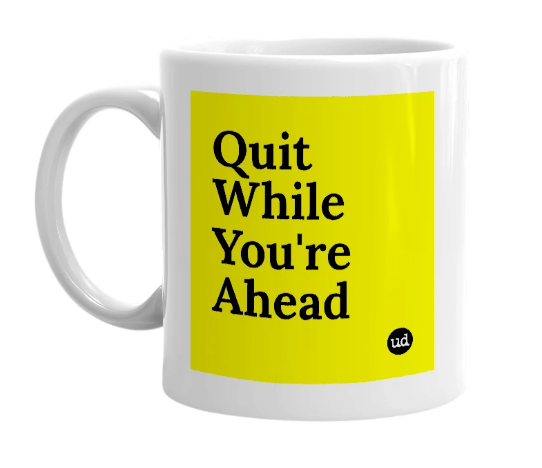 White mug with 'Quit While You're Ahead' in bold black letters