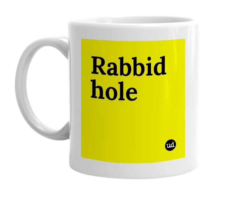 White mug with 'Rabbid hole' in bold black letters