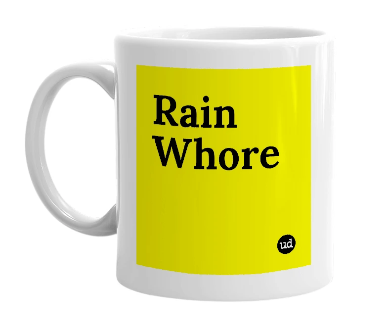 White mug with 'Rain Whore' in bold black letters