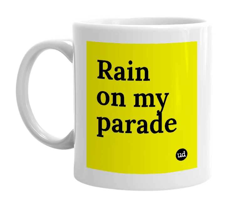 White mug with 'Rain on my parade' in bold black letters