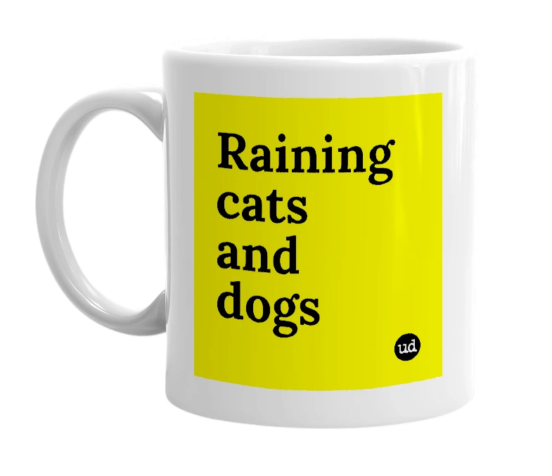 White mug with 'Raining cats and dogs' in bold black letters