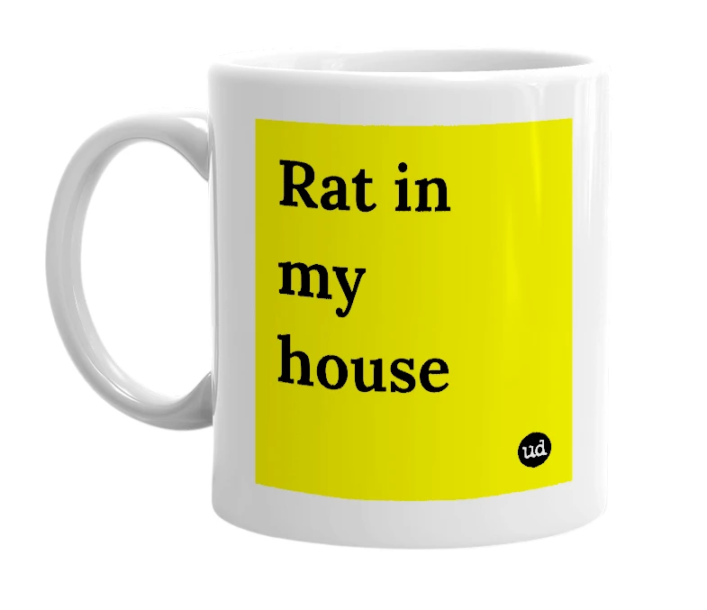 White mug with 'Rat in my house' in bold black letters