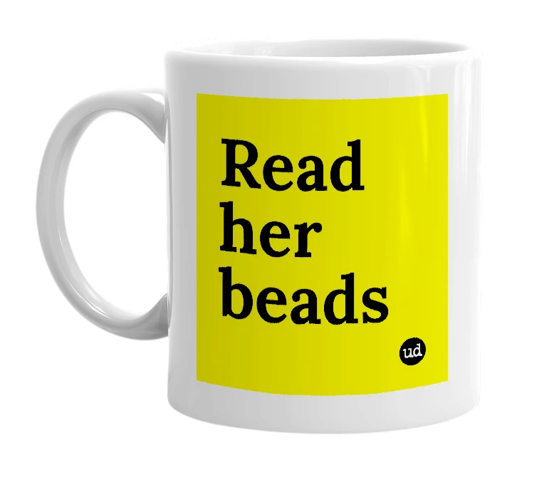 White mug with 'Read her beads' in bold black letters