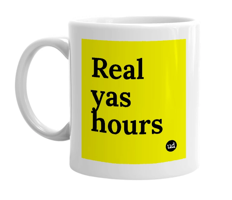 White mug with 'Real yas hours' in bold black letters