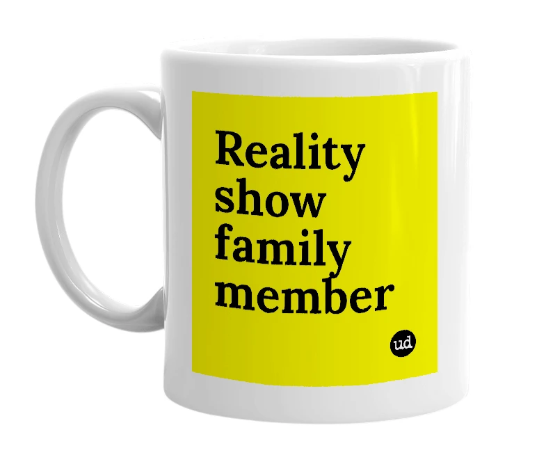 White mug with 'Reality show family member' in bold black letters
