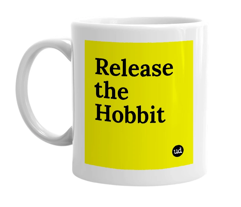 White mug with 'Release the Hobbit' in bold black letters