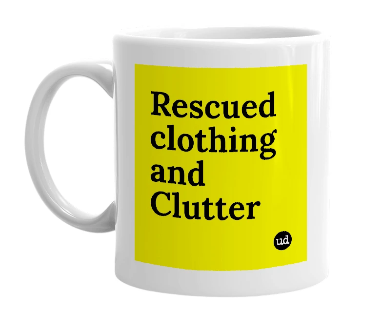 White mug with 'Rescued clothing and Clutter' in bold black letters
