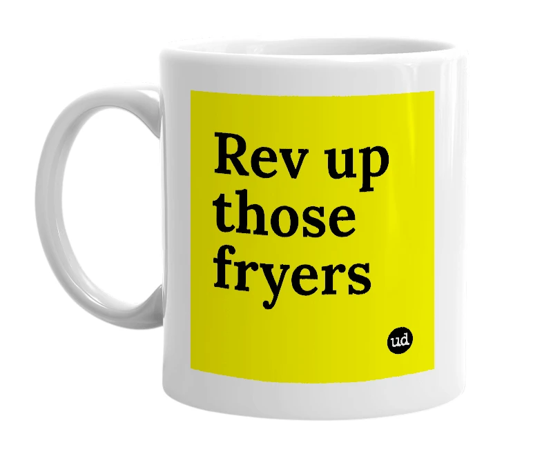 White mug with 'Rev up those fryers' in bold black letters