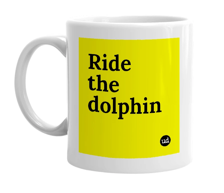 White mug with 'Ride the dolphin' in bold black letters