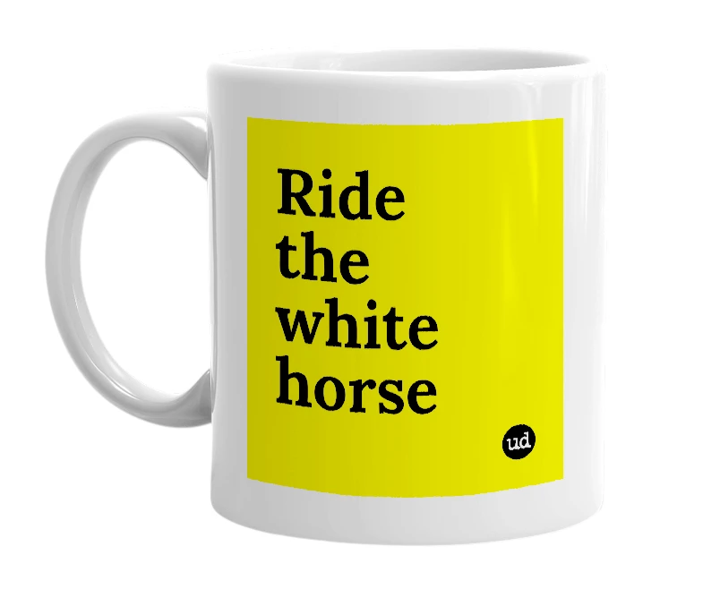 White mug with 'Ride the white horse' in bold black letters