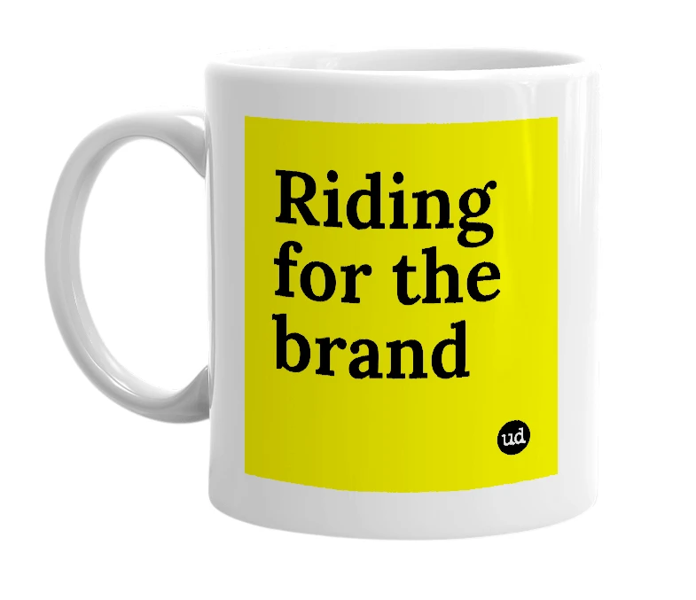 White mug with 'Riding for the brand' in bold black letters