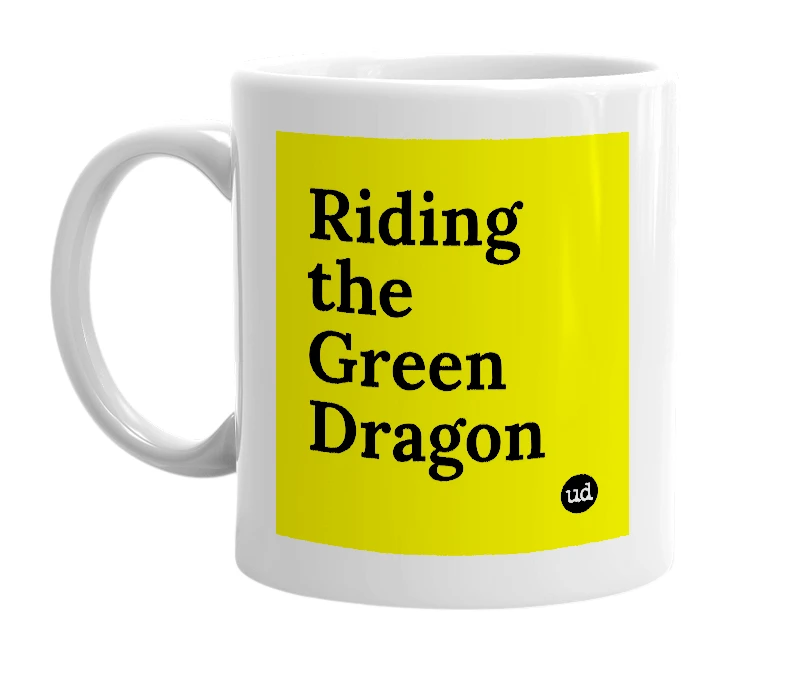 White mug with 'Riding the Green Dragon' in bold black letters