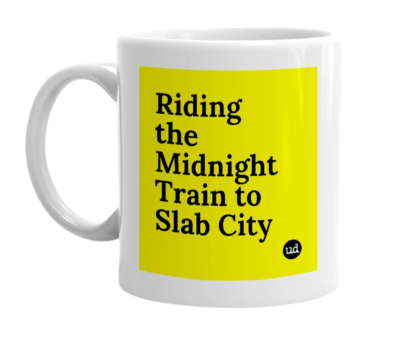 White mug with 'Riding the Midnight Train to Slab City' in bold black letters