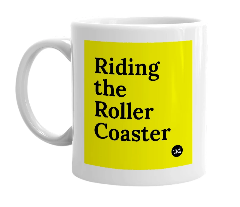White mug with 'Riding the Roller Coaster' in bold black letters